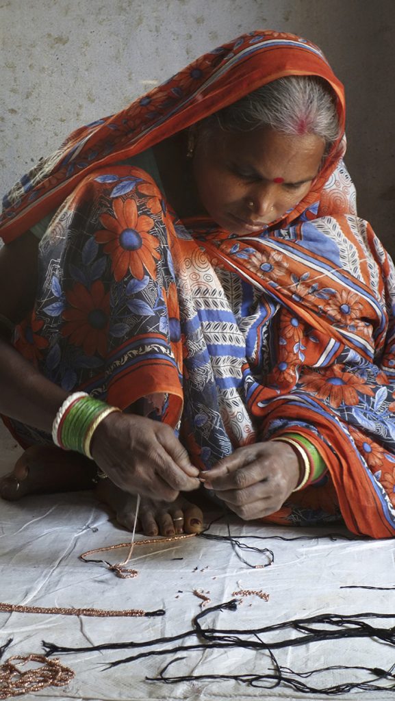 Stringing of Dhokra Beads
